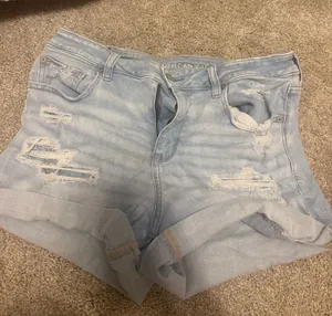 American eagle light wash next level stretch mid rise jean shorts size 12 thumbnail 1