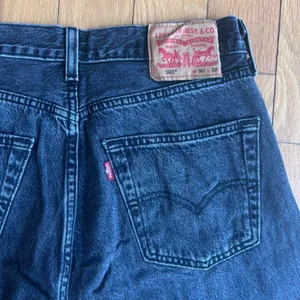 Levi's Black 501 high-rise straight-leg denim jeans thumbnail 7