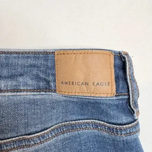 American Eagle Super Hi-Rise‎ Jegging Womens 10 Short Blue Distressed Jeans thumbnail 12