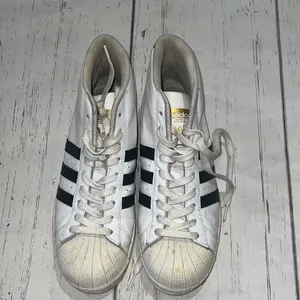 Adidas white and black high top sneakers thumbnail 2