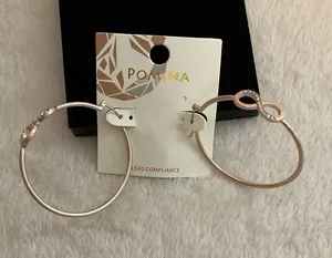 Pomina Rose Gold Hoop Earrings with Infinity Detail thumbnail 1