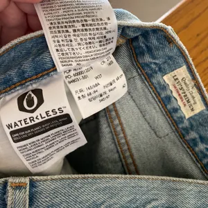 Levi's 501 High Rise Distressed Denim Cut-off Shorts in Fault Line thumbnail 5