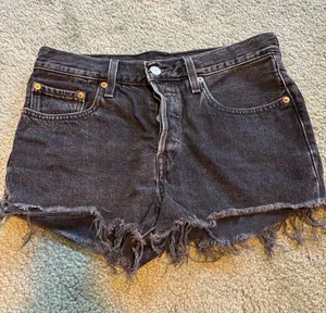 Levi's 501 Black Frayed-Hem Denim Cutoff Shorts thumbnail 1