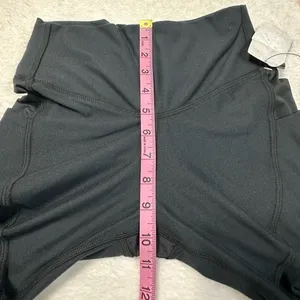 UFC Women's Black Bike Shorts with Red Logo and Side Pockets thumbnail 9