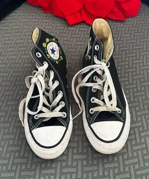 Black Converse sneakers with embroidered floral design thumbnail 1
