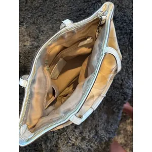 Signature coach bag with accent thumbnail 11