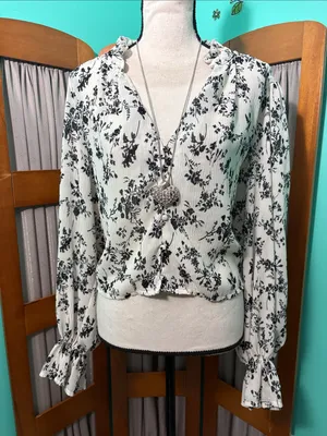 Lulu's Black & White Floral Ruffle V-Neck Blouse thumbnail 1