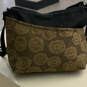 ERDA Luxurious Brown and Black Crossbody Bag with Monogram Design-American made thumbnail 1