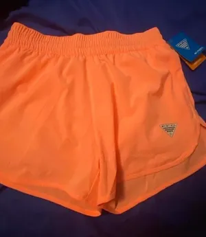 Neon Orange Women’s Athletic Shorts - Columbia thumbnail 1