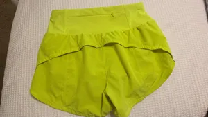 Bright yellow running shorts Size M thumbnail 2