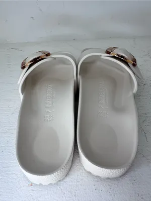 Birkenstock White Slide Sandals with Gold Buckle thumbnail 4