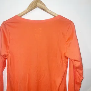 Nike Orange “the Nike tee” athletic cut Dri-fit long sleeve v neck tee thumbnail 9