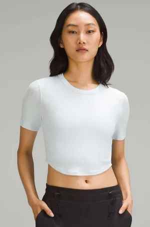 Lululemon Hold Tight Cropped Short Sleeve Ribbed TShirt ~4 Light Blue Curved Hem thumbnail 1