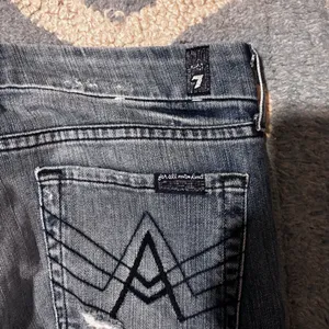 7 For All Mankind Distressed Flare Jeans in Dark Blue thumbnail 6