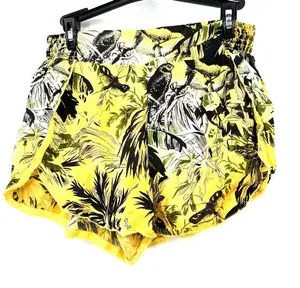 by Anthropologie size XS yellow black‎ palm tree print dolphin style shorts thumbnail 1