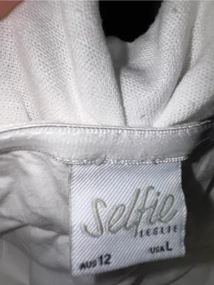 Selfie Leslie Off-Shoulder Ruffle Crop Top in Cream thumbnail 10