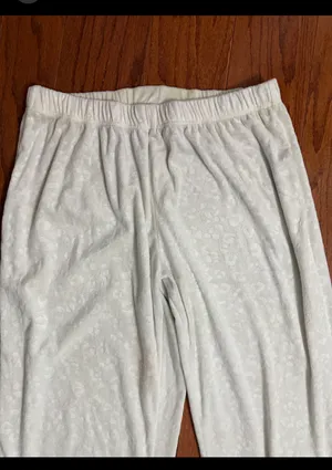 Nicole Miller Cream Embossed Paw pattern lounge pants - Size Medium. Super cute & soft & gently used & very good condition. Measurements approximately 15” waste not fully stretched out from elastic waste band x 39” long x 11” rise. Non-smoking home m. Priced to sell at as is condition. Don’t like my price make reasonable offer! thumbnail 2