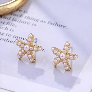 Gold Starfish Pearl Earrings thumbnail 3