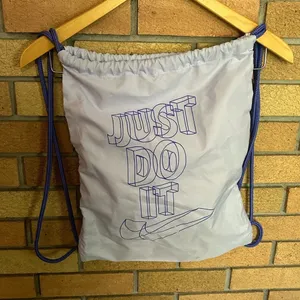 Nike Light Purple Just Do It Printed Drawstring Lightweight Bag Backpack thumbnail 1