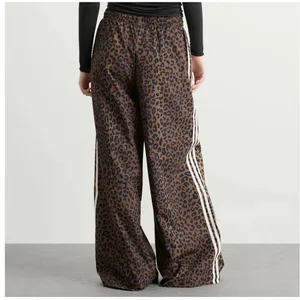 ADIDAS leopard printed oversized track pants thumbnail 5