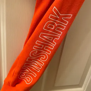 Gymshark Apollo Graphic Long Sleeve Crop Top Size Small Orange thumbnail 4