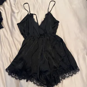 Black lace romper with lace trim thumbnail 2