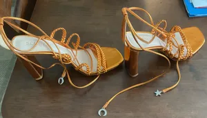 Schutz Lunah strappy sandals in a metallic gold finish. thumbnail 5