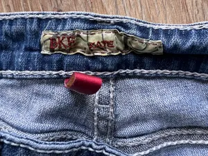 🌟 BKE “Kate” Distressed Bootcut Jeans – Size 27R 🌟 Trendy and comfortable BKE Kate jeans in a flattering bootcut fit! These jeans feature stylish distressed knee details, light fading, and signature stitched back pockets for that perfect everyday look. ✨ Details: • Brand: BKE Kate • Size: 27 Regular • Bootcut style • Distressed/ripped knees • Medium wash denim • Great pre-owned condition with lots of life left Perfect with boots, sneakers, or a cute casual top! thumbnail 4