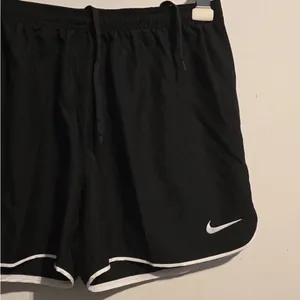 Nike Women's Black Athletic Mesh Shorts with White Trim thumbnail 10