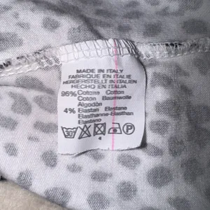 Brandy Melville Black and White Dotted Wrap Top thumbnail 10