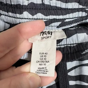 H&M Sport Black & White Zebra Print Running Shorts - Size 10 - Built in Brief thumbnail 3