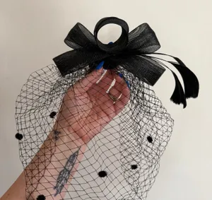 Vintage Black Feather Fascinator with Dot Birdcage Veil thumbnail 1