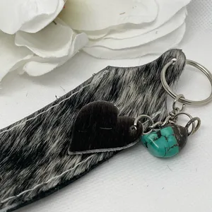 Cowhide chapstick holder. Attach to purse or backpack to keep it handy! thumbnail 2