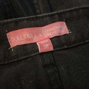 DOLLS KILL X STRAWBERRY SHORTCAKE PATCHED WITH LOVE CARGO PANTS size M thumbnail 4