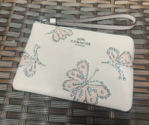 coach Corner Zip Wristlet With Sparkly Butterfly Print ccj72 thumbnail 1