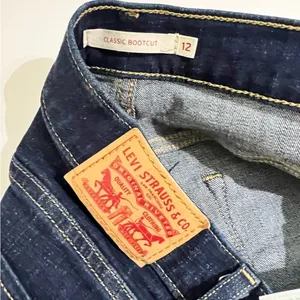 Levi's Classic Bootcut Dark Wash Jeans Size 12 Short W31 L30 thumbnail 4