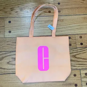 Macys Clinique Large Shopping Shoulder Travel Orange Tote Bag With Pink C Logo thumbnail 1