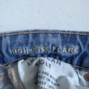 American Eagle High Rise Flare Solid Jeans Blue Retro Boho Stretch Size 000 thumbnail 6