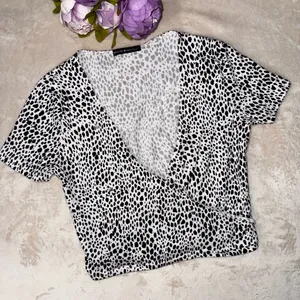 Brandy Melville Black and White Dotted Wrap Top thumbnail 2