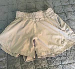 Lululemon Hotty Hot shorts light pink/gray women’s size 4 thumbnail 1