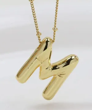 Elegant Gold 'M' Pendant Necklace thumbnail 4