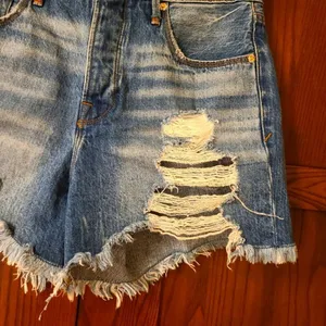 Good American Blue Distressed Jean Shorts thumbnail 5