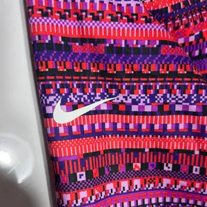 Nike Women’s Pink & Purple Striped Quarter-Zip Pullover thumbnail 12