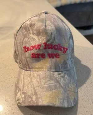 Altar'd State Camo “How lucky are we” Hat thumbnail 1