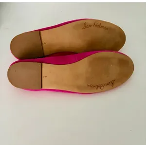 Vibrant pink suede, leather ballet flats by Sam Edelman. Featuring a rounded toe with silver logo charm detail. Perfect for adding flair to any outfit. thumbnail 6
