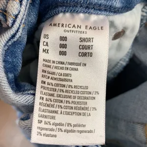 American Eagle Luxe Stretch Hi-Rise Distressed/Ripped Light Wash Jegging Jeans thumbnail 4