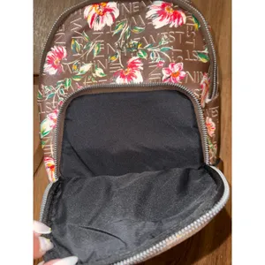 Small Nine West floral purse backpack. Minor flaw‎ on back in pictures. thumbnail 3