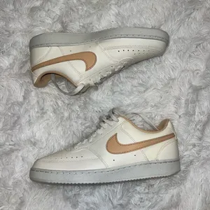 Nike Court Vision Low Basic White and Neutral Sneakers Tan Swoosh thumbnail 1