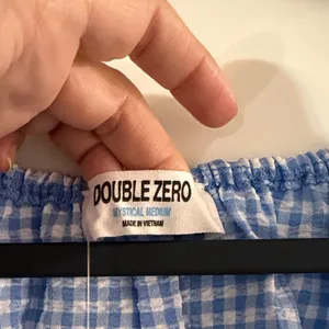 Double Zero Light Blue Gingham Peplum Cap-Sleeve Blouse thumbnail 2
