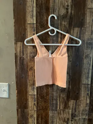 NIKIBIKI Women Seamless Plunge V-Neck Ribbed Crop Top, Made in U.S.A, One Size Elevate your style with this chic peach ribbed V-neck top. Perfect for any occasion. thumbnail 6